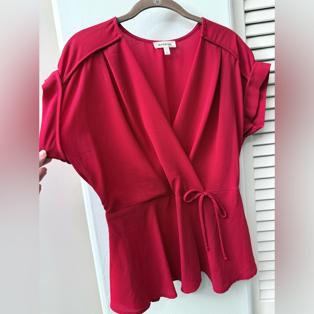 Bright red crepe top with peplum waist